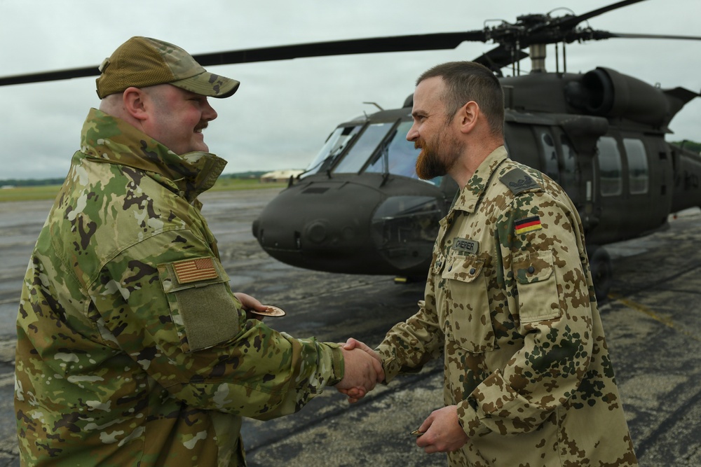 Fueling Partnership: German and 110th Logistics Readiness Squadron Airmen Refuel UH-60 Black Hawk