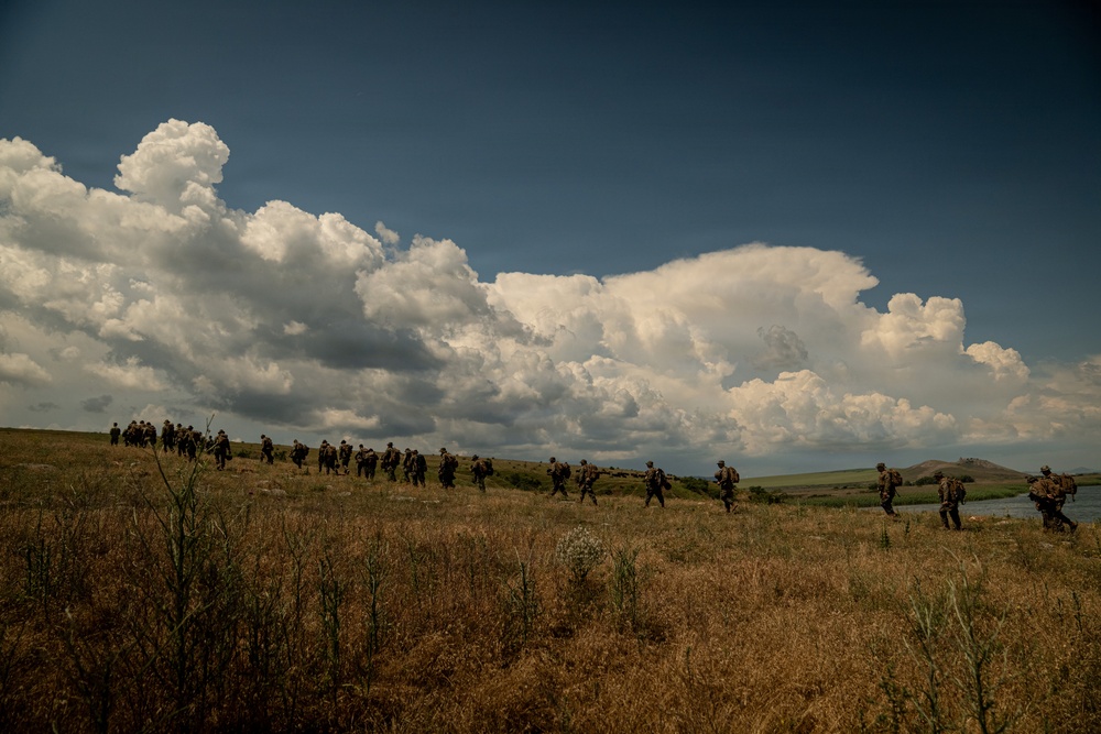 U.S. Marines and Romanian forces conduct combat rubber raiding craft operations in Romania
