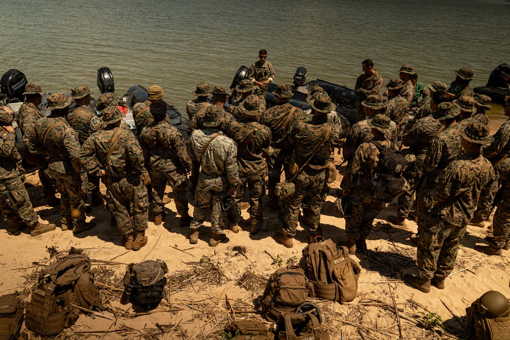 U.S. Marines and Romanian forces conduct combat rubber raiding craft operations in Romania