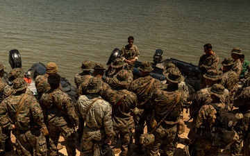 U.S. Marines and Romanian forces conduct combat rubber raiding craft operations in Romania