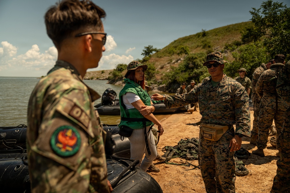 U.S. Marines and Romanian forces conduct combat rubber raiding craft operations in Romania