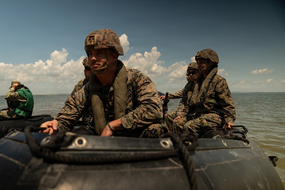 U.S. Marines and Romanian forces conduct combat rubber raiding craft operations in Romania