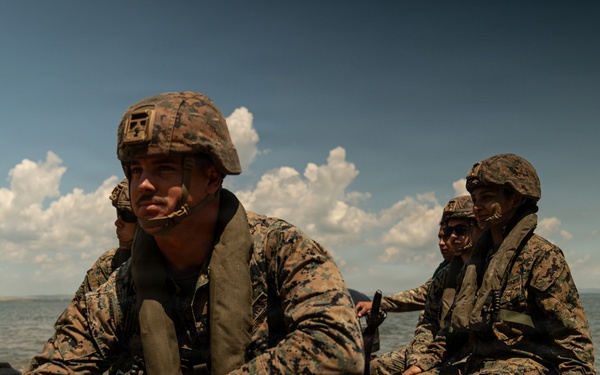 U.S. Marines and Romanian forces conduct combat rubber raiding craft operations in Romania