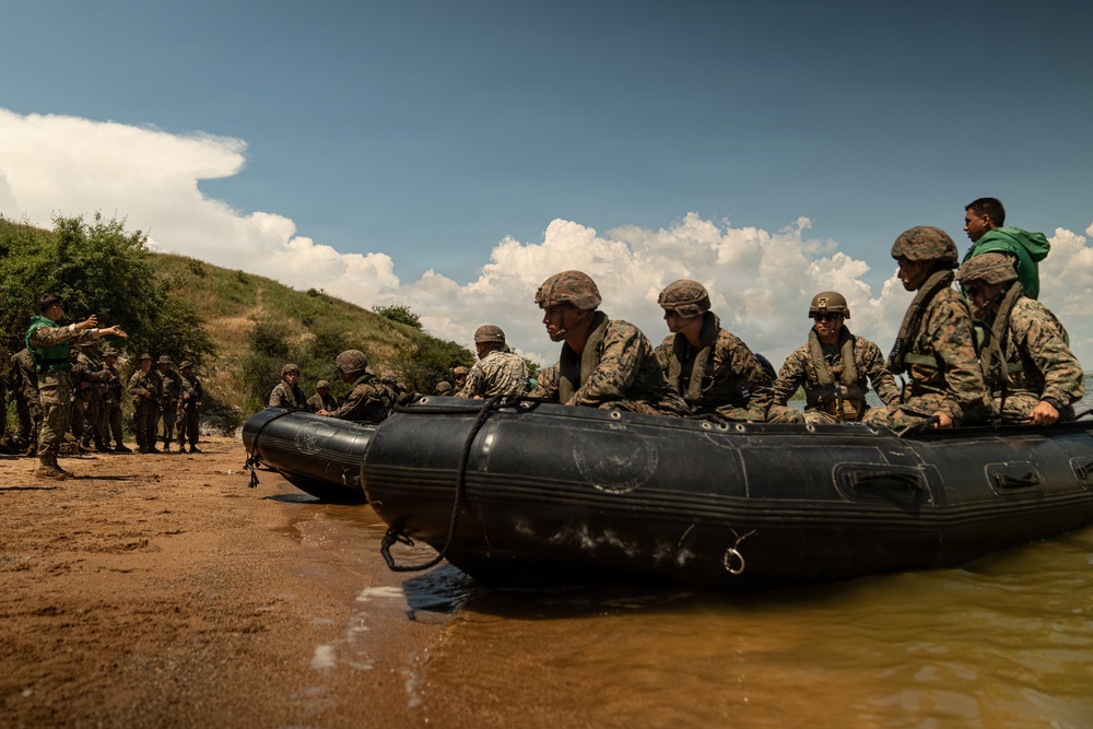 U.S. Marines and Romanian forces conduct combat rubber raiding craft operations in Romania