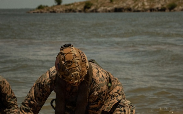 U.S. Marines and Romanian forces conduct combat rubber raiding craft operations in Romania