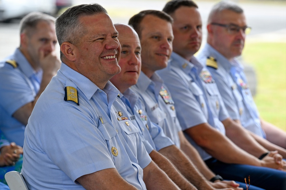 U.S. Coast Guard Officers Attend Outdoor Military Ceremony