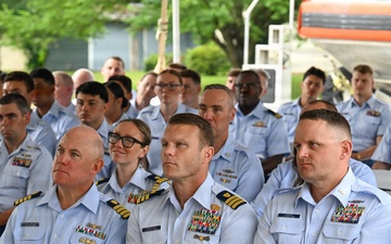 U.S. Coast Guard personnel attend formal ceremony