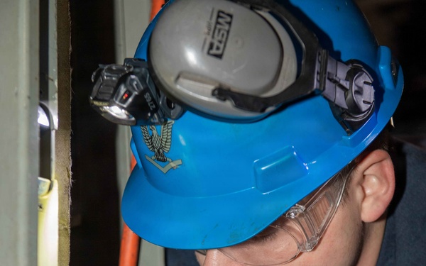 NNS Helps Sailors Use Pneumatic Drill