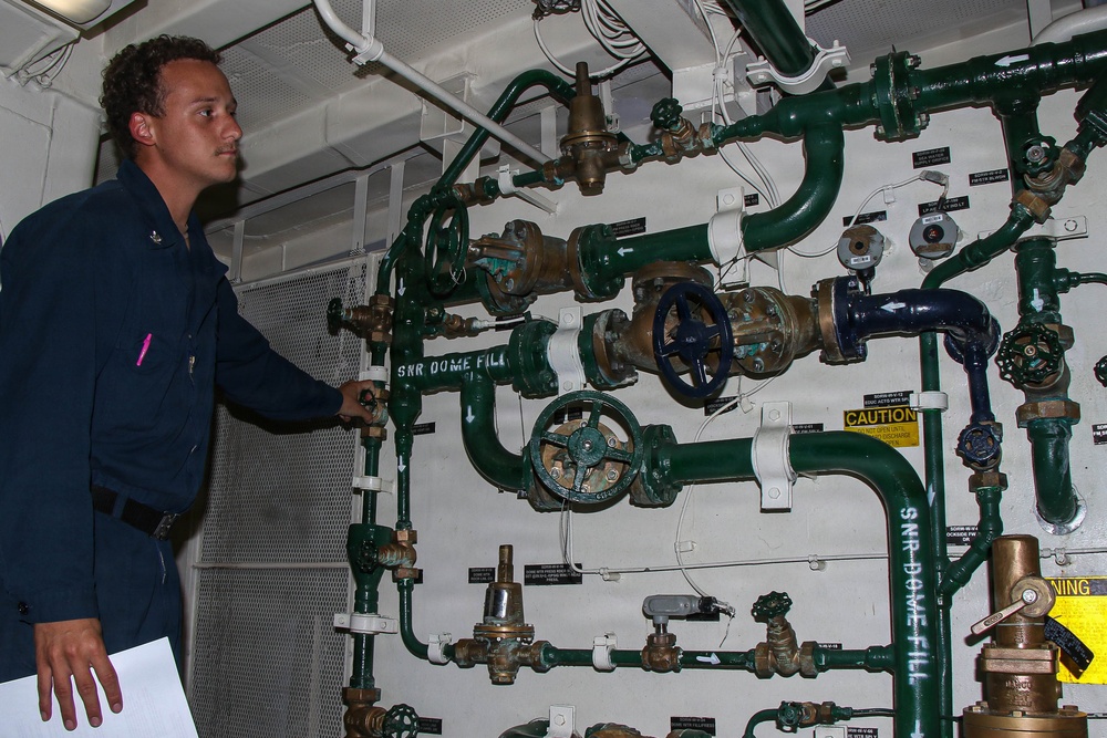 Frank E. Petersen Jr. Sailor Conducts Maintenance