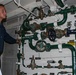 Frank E. Petersen Jr. Sailor Conducts Maintenance