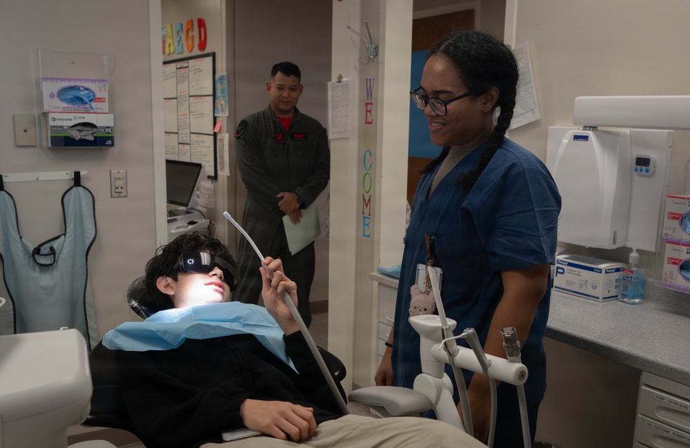 Children show their pearly whites for dental day