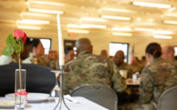 Service members attend the Commander's Prayer Breakfast