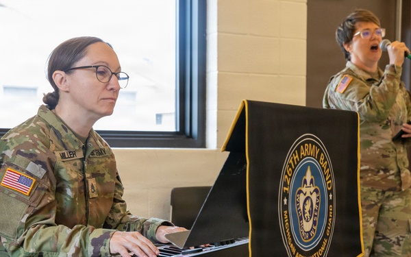 Service members attend the Commander's Prayer Breakfast