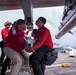 Nimitz Sailors Load Ordnance