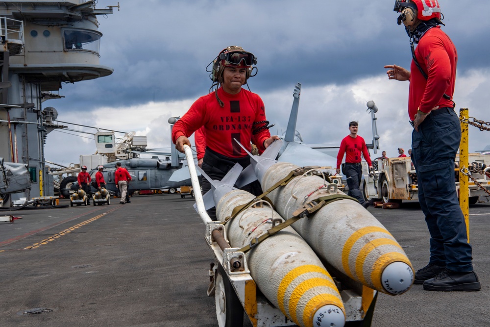 Nimitz Sailors Load Ordnance