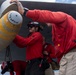 Nimitz Sailors Load Ordnance
