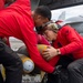Nimitz Sailors Load Ordnance