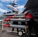 Nimitz Sailors Load Ordnance