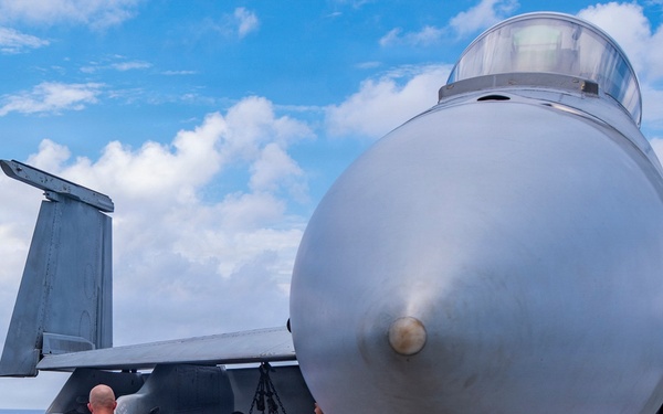 Nimitz Sailors Load Ordnance