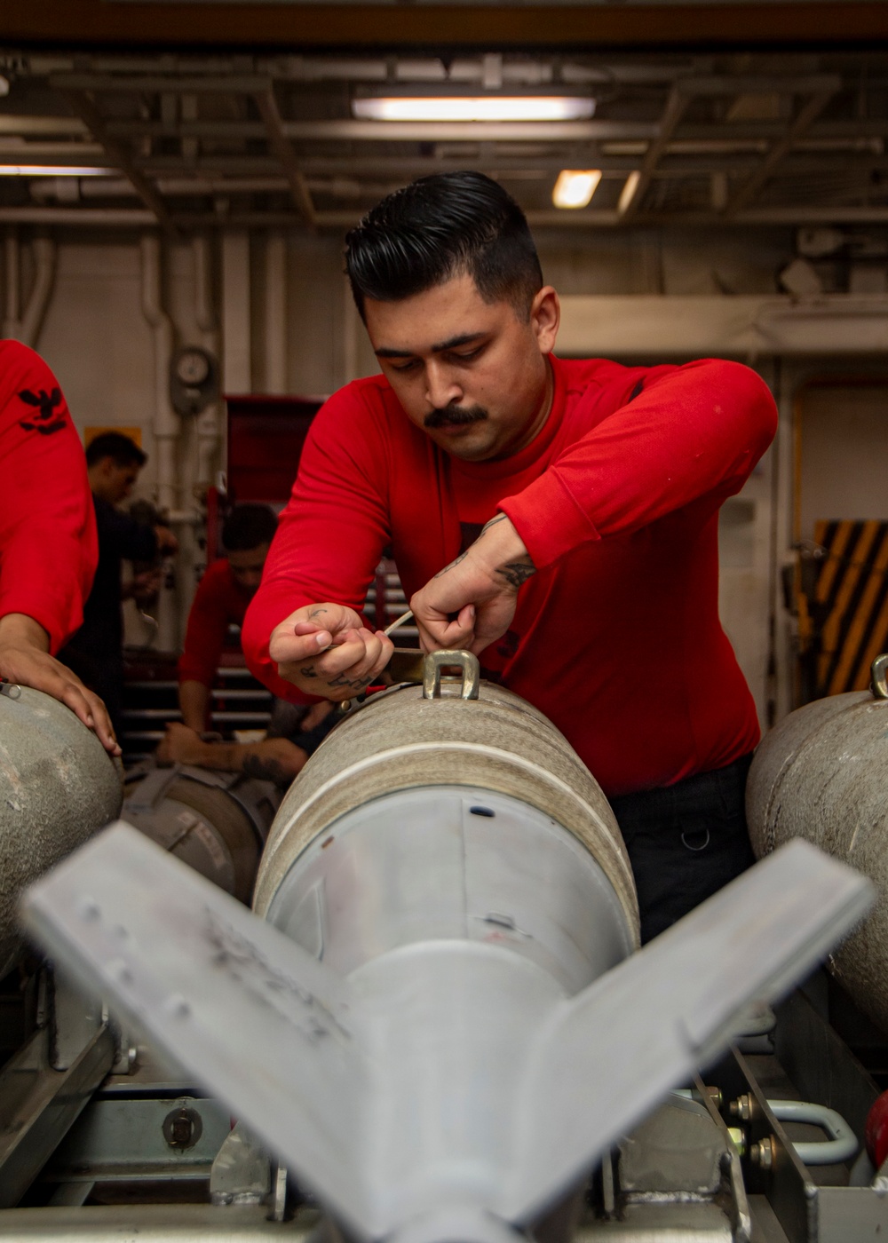 Nimitz Sailors Assemble Ordnance