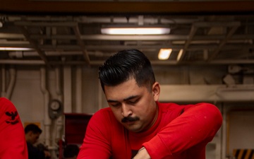 Nimitz Sailors Assemble Ordnance