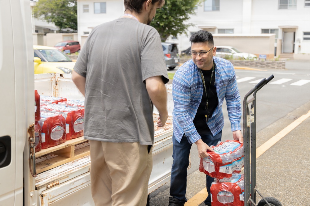 CFAY Distributes Water to Community Members, Tenants