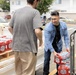 CFAY Distributes Water to Community Members, Tenants