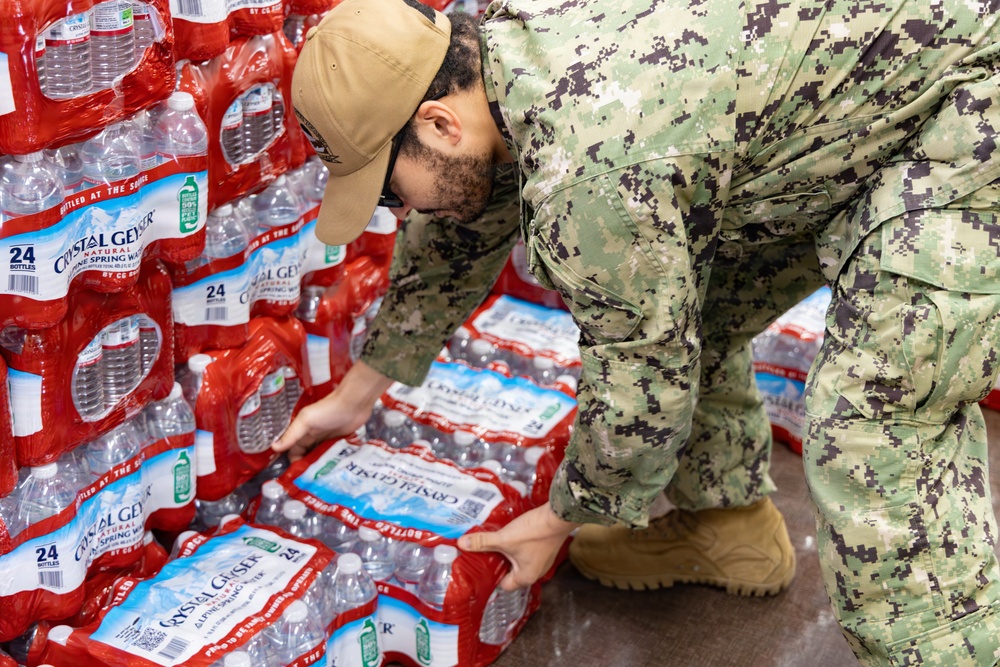 CFAY Distributes Water to Community Members, Tenants