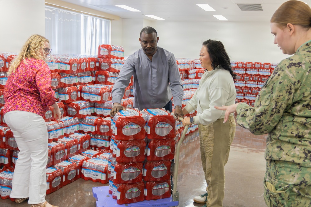 CFAY Distributes Water to Community Members, Tenants