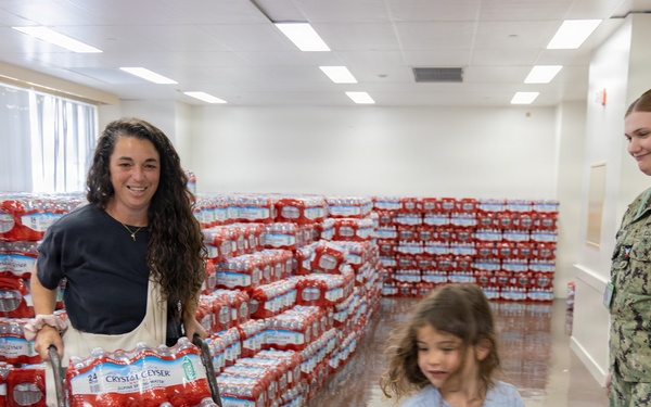 CFAY Distributes Water to Community Members, Tenants