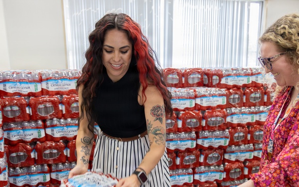 CFAY Distributes Water to Community Members, Tenants
