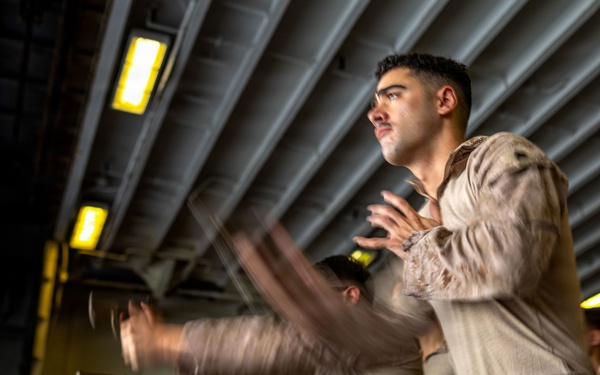 11th MEU Marines, Sailors Conduct a M18 Dry Fire Range Aboard USS Boxer