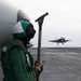USS George H.W. Bush landing a F/A-18E Super Hornet