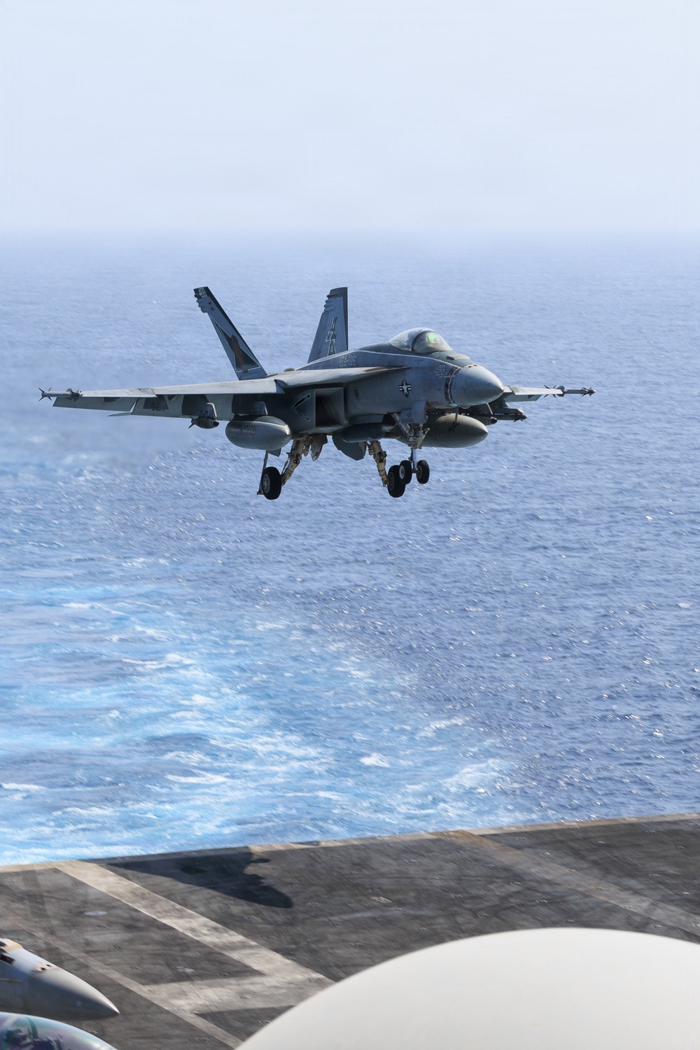 USS George H.W. Bush lands a F/A-18E Super Hornets