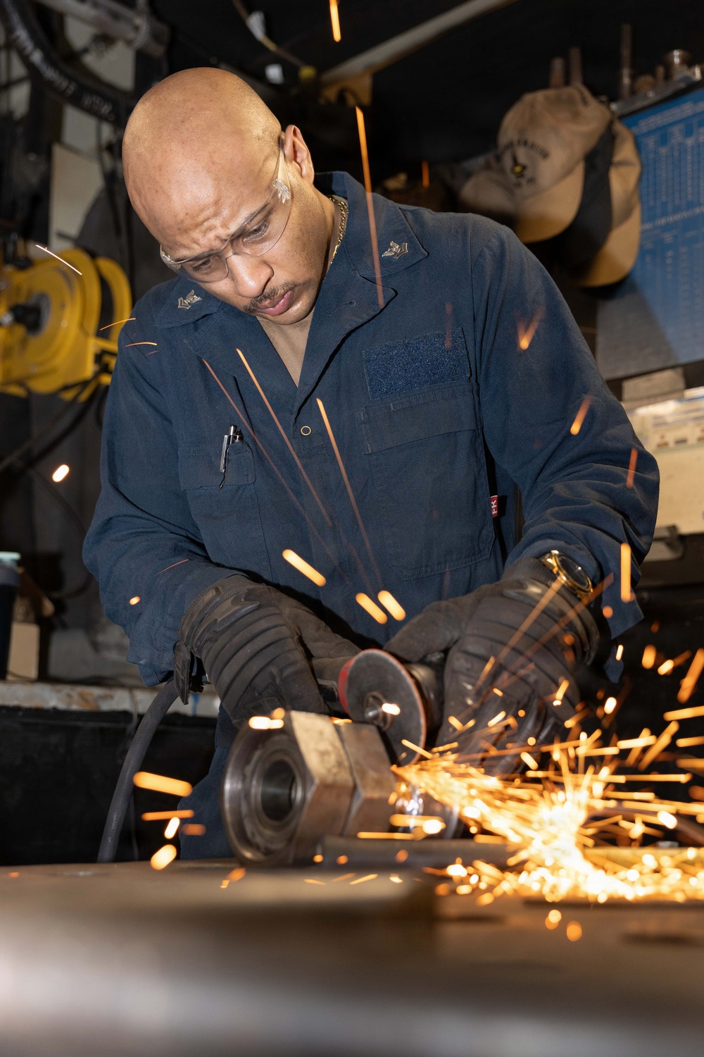 USS George H.W. Bush maintains catapult equipment