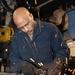 USS George H.W. Bush maintains catapult equipment