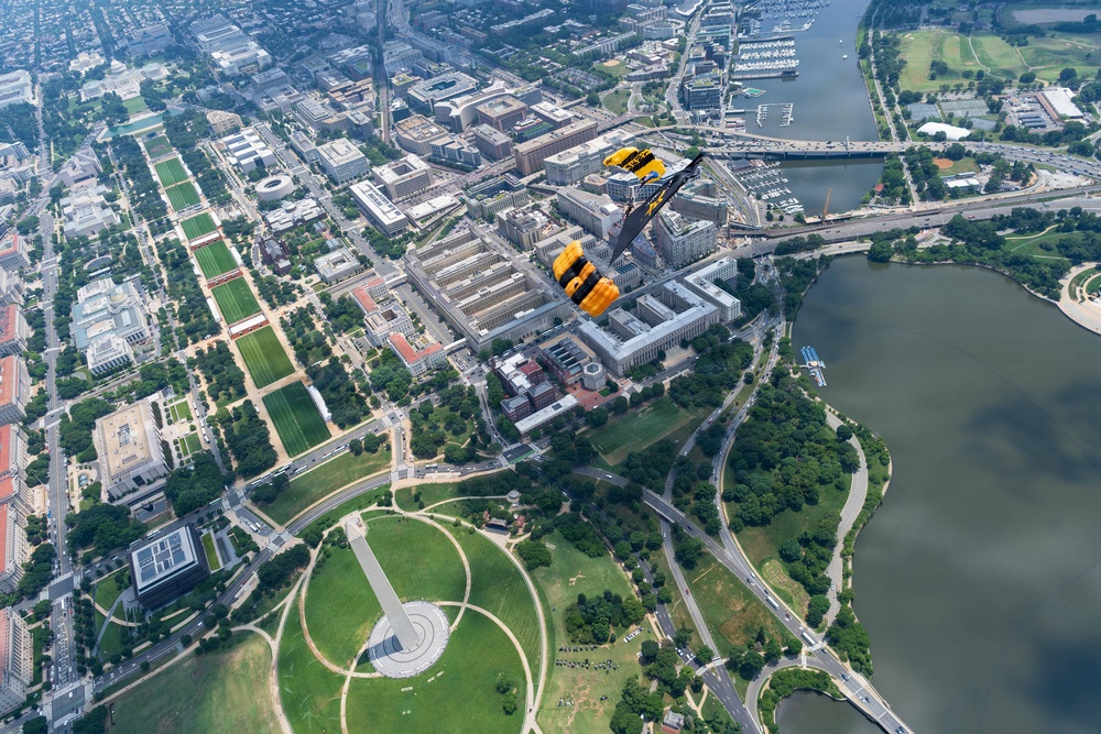 The U.S. Army Parachute Team jumps over Washington Monument for Freedom 250 events