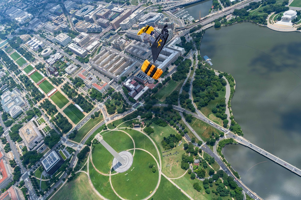 The U.S. Army Parachute Team jumps over Washington Monument for Freedom 250 events