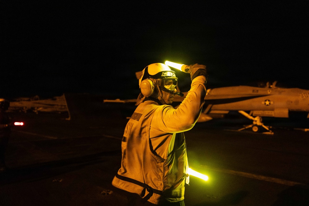 USS George H.W. Bush signals the shot line is safe for launch