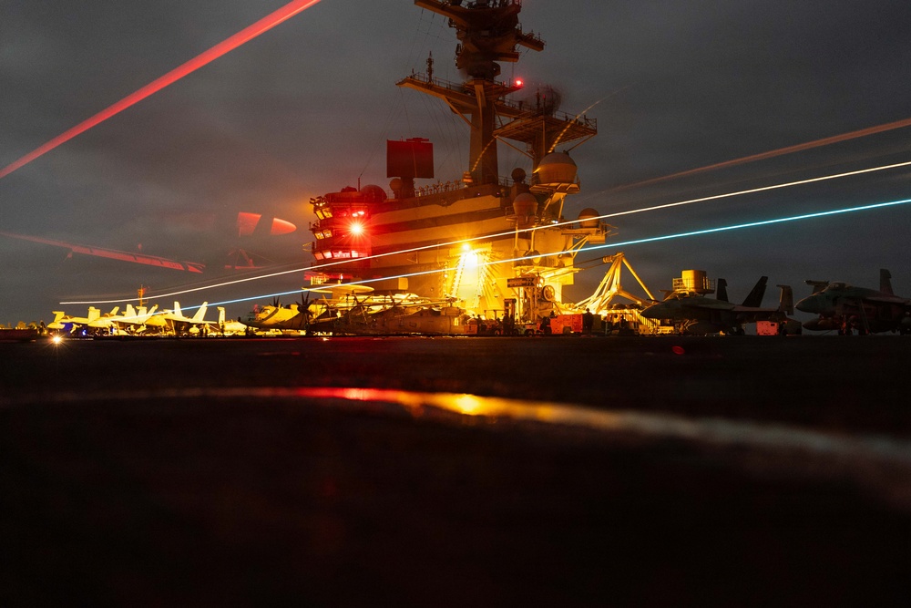 USS George H.W. Bush lands a E-2C Hawkeye