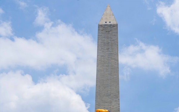 The U.S. Army Parachute Team jumps over Washington Monument for Freedom 250 events