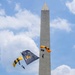 The U.S. Army Parachute Team jumps over Washington Monument for Freedom 250 events