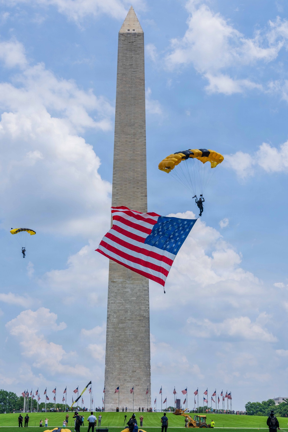 The U.S. Army Parachute Team jumps over Washington Monument for Freedom 250 events