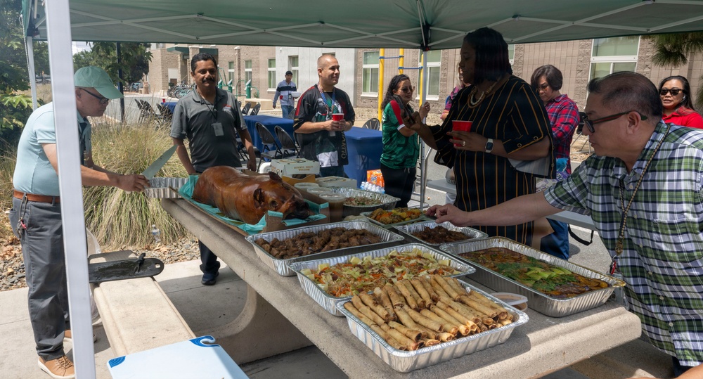 Naval Base San Diego Unaccompanied Housing staff Hail And Farewell for Ms. Regina Skaggs and Jose Dopeno.