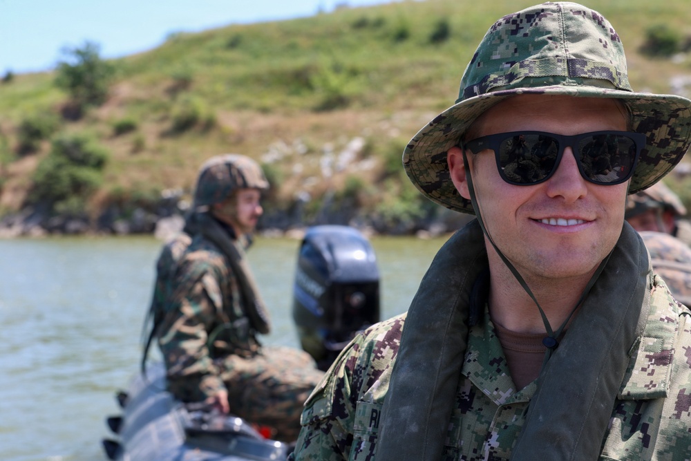 U.S. Marines and Romanian forces conduct combat rubber raiding craft operations in Romania