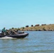 U.S. Marines and Romanian forces conduct combat rubber raiding craft operations in Romania