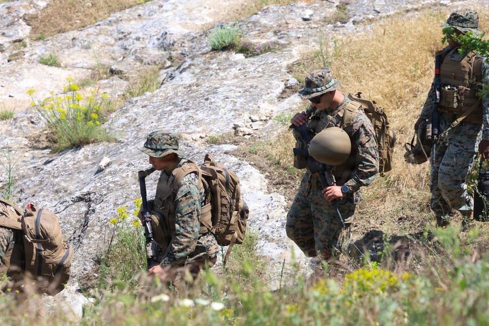 U.S. Marines and Romanian forces conduct combat rubber raiding craft operations in Romania