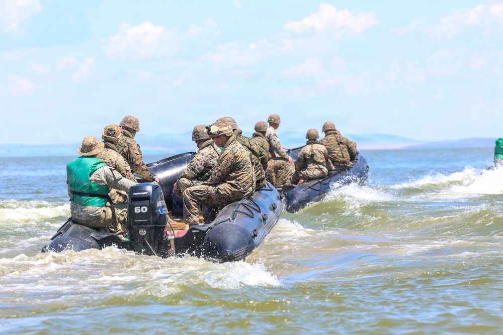 U.S. Marines and Romanian forces conduct combat rubber raiding craft operations in Romania