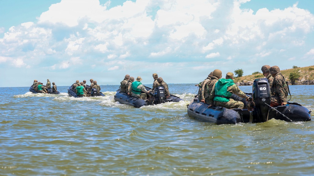 U.S. Marines and Romanian forces conduct combat rubber raiding craft operations in Romania