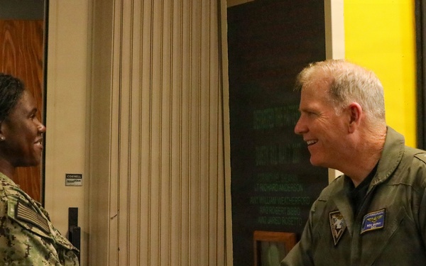 Rear Adm. Rich Brophy recognizes enlisted Sailor assigned HSC-7